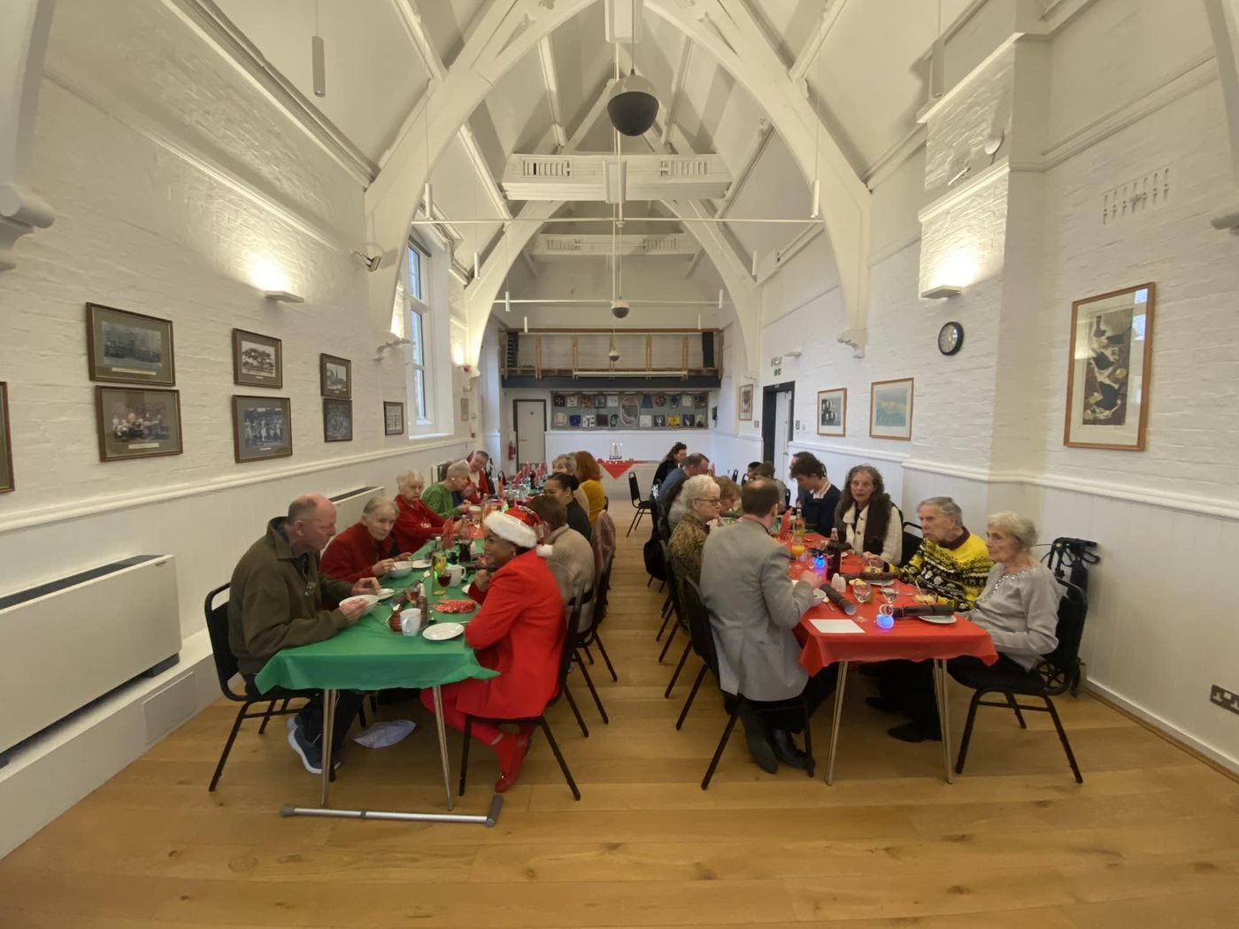 Tables laid out in the village hall for the Olney is Kind Christmas lunch