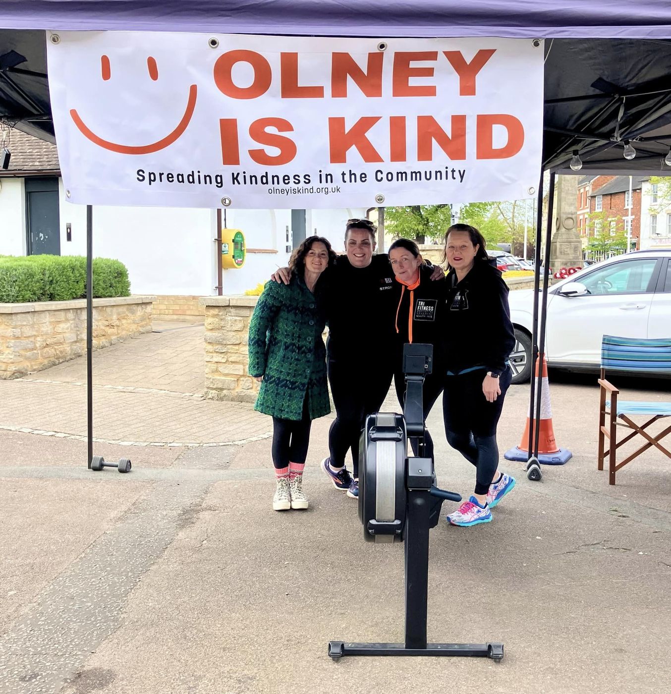 Olney is Kind volunteers at the rowathon under the charity banner